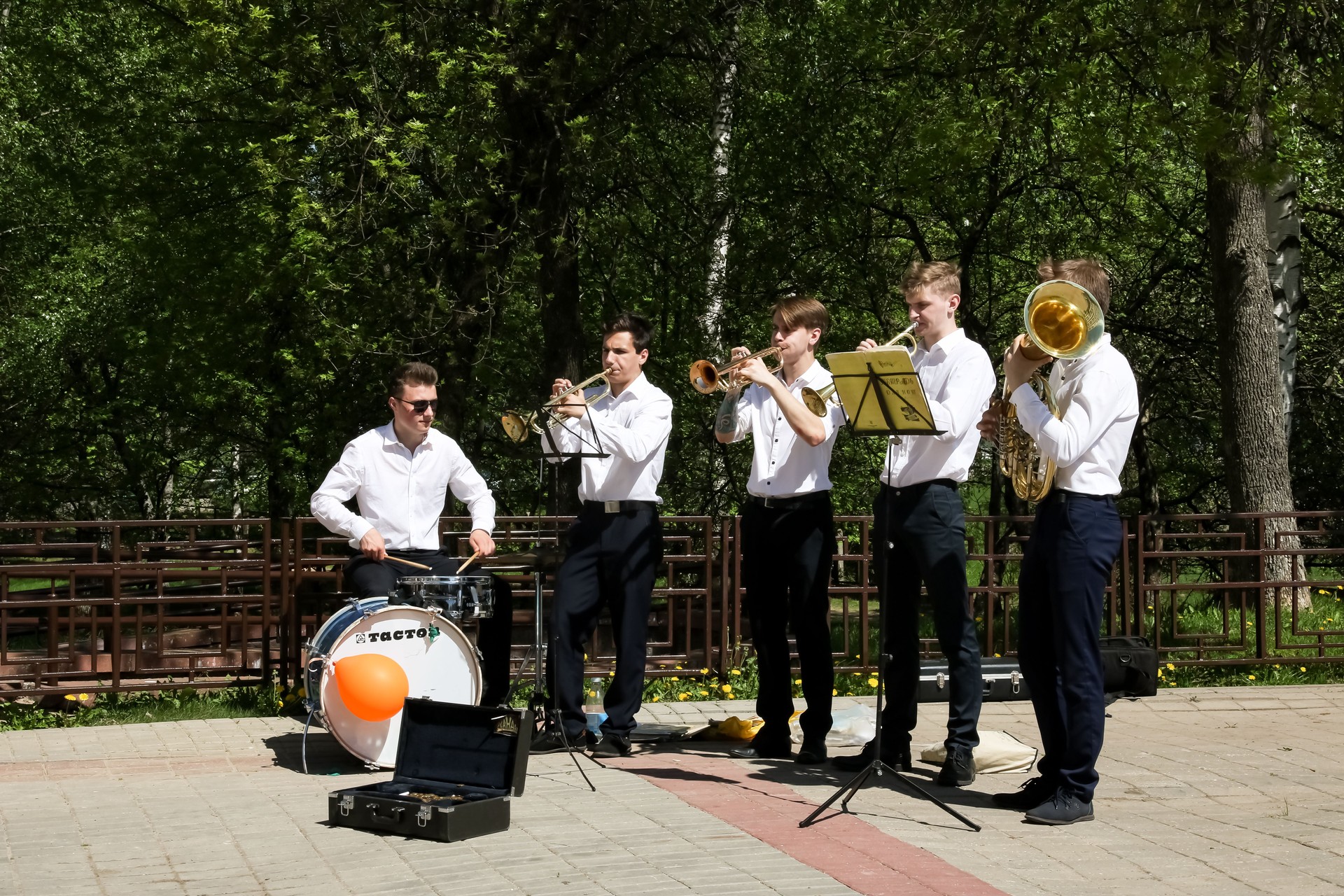 Musician guys in summer park